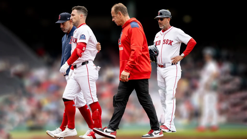 Alex Bregman of the Boston Red Sox leaving the game during the fifth inning of game due to a injury.
