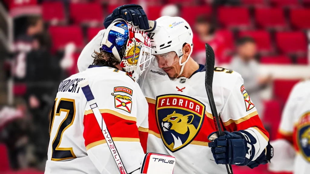 Tomas Nosek of the Florida Panthers celebrates with goaltender Sergei Bobrovsky of the Florida Panthers after defeating the Carolina Hurricanes 5-2 in Game One of the Eastern Conference Final of the 2025 Stanley Cup Playoffs.
