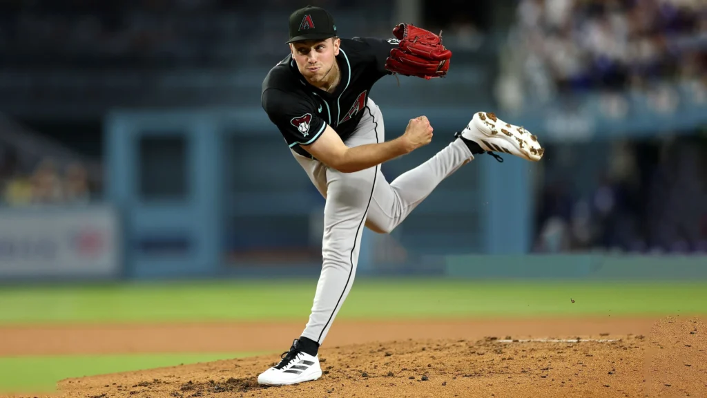 Brandon Pfaadt, a baseball player of Arizona Diamondbacks throwing a pitch against LA Dodgers.