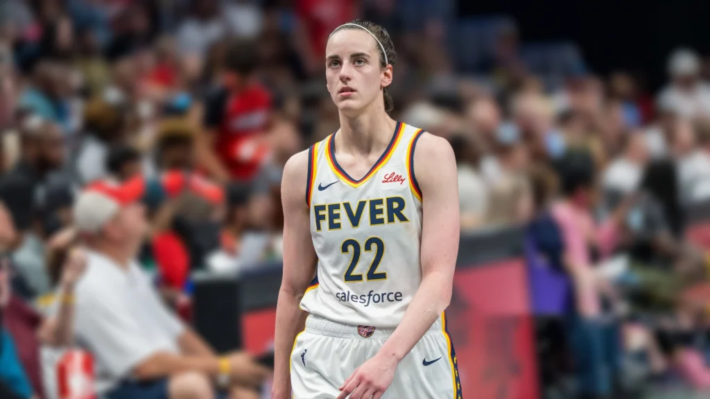 Caitlin Clark of the Indiana Fever walks to the bench frustrated during the fourth quarter of a game between the Indiana Fever and Atlanta Dream.