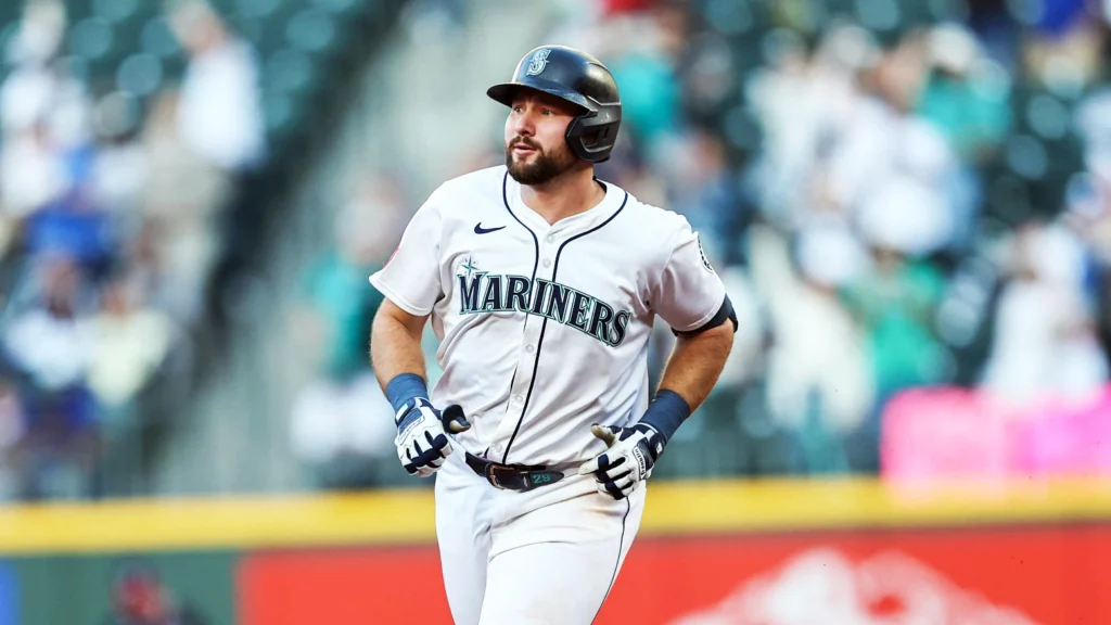 Cal Raleigh runs the bases after hitting a home run in the fifth inning during a game against the Washington Nationals.
