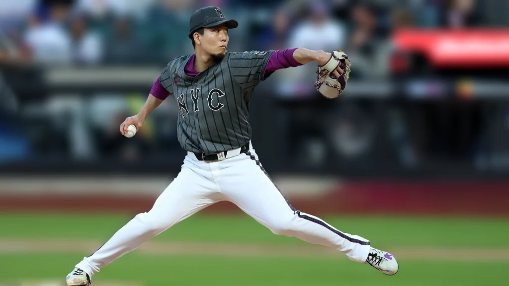 Kodai Senga, a professional baseball player, is captured in action, pitching a baseball.