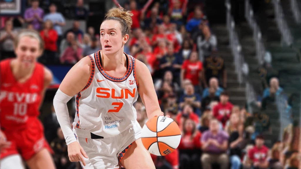 Marina Mabrey of the Connecticut Sun drives to the basket during the game against the Indiana Fever.