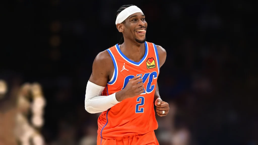 Shai Gilgeous-Alexander of the Oklahoma City Thunder flashes a smile during the first half against the Los Angeles Clippers at Paycom Center.