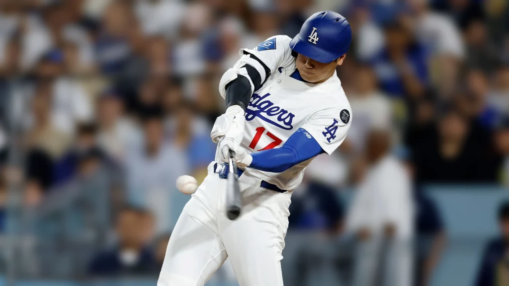 Shohei Ohtani of the Los Angeles Dodgers hits a solo home run during the sixth inning against the New York Yankees.