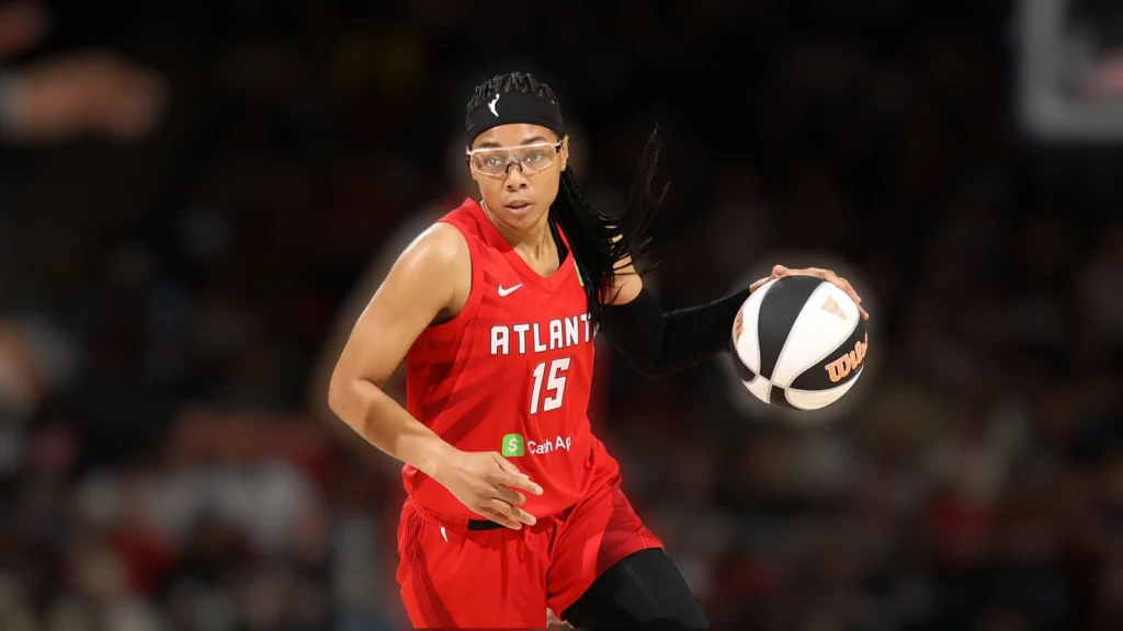 Allisha Gray of the Atlanta Dream handles the ball during the game against the Washington Mystics during a 2025 Commissioner's Cup game.