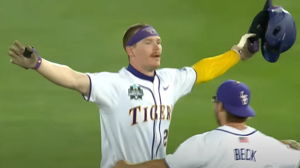 LSU's Jared Jones celebrates after his walk-off RBI single secured a dramatic 6-5 comeback victory over Arkansas in the 2025 College World Series semifinals, sending the Tigers to the championship series.