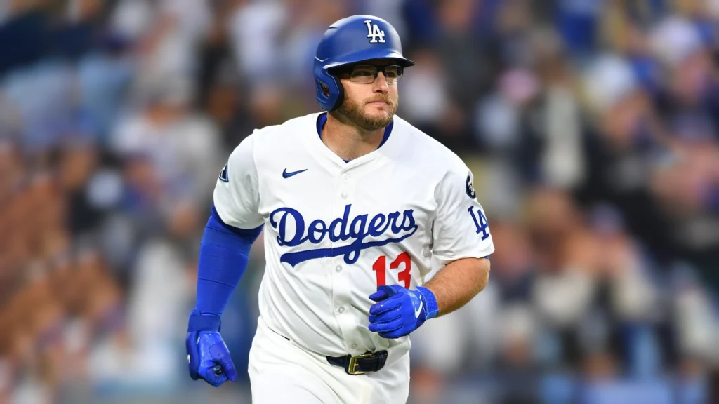 Los Angeles Dodgers third baseman Max Muncy runs up the line after hitting a home run during the MLB game against the New York Mets.
