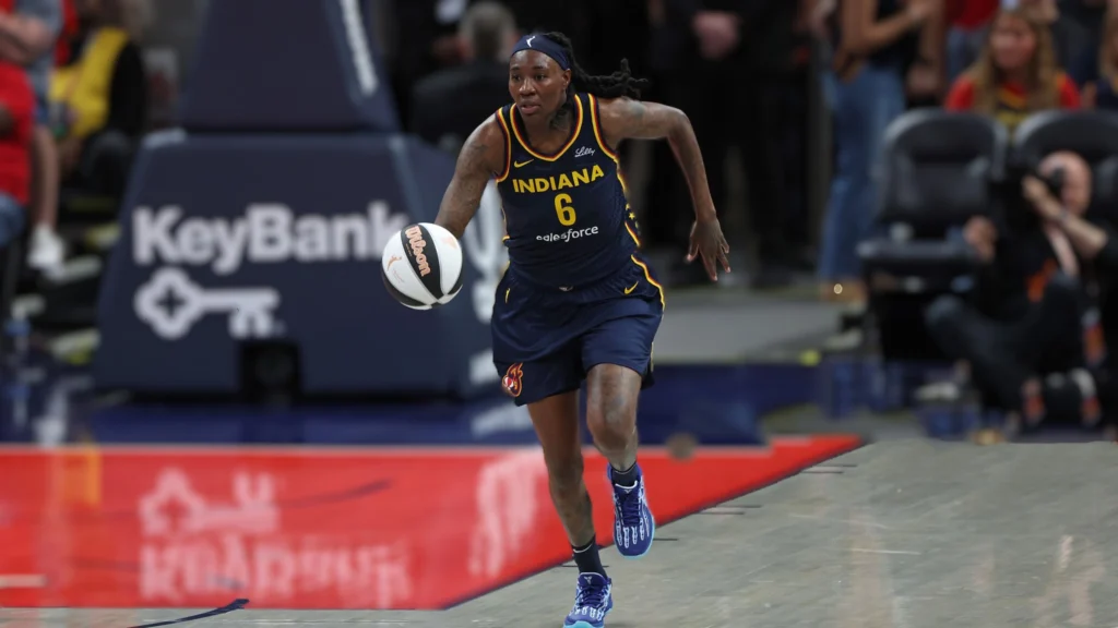 Indiana Fever's Natasha Howard (No. 6) drives to the basket during a recent WNBA game, showcasing her dynamic play.