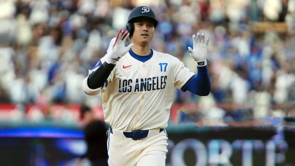 Shohei Ohtani of the Los Angeles Dodgers rounds the bases after hitting a home run during the game against the San Francisco Giants.