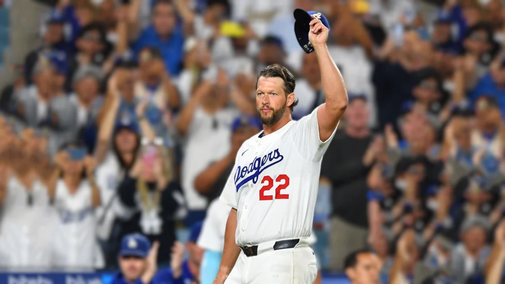 Legendary Dodgers pitcher Clayton Kershaw acknowledges the fans after a significant achievement on the mound.